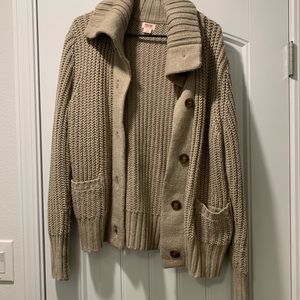 Warm, thick tan sweater! Has buttons and pockets!